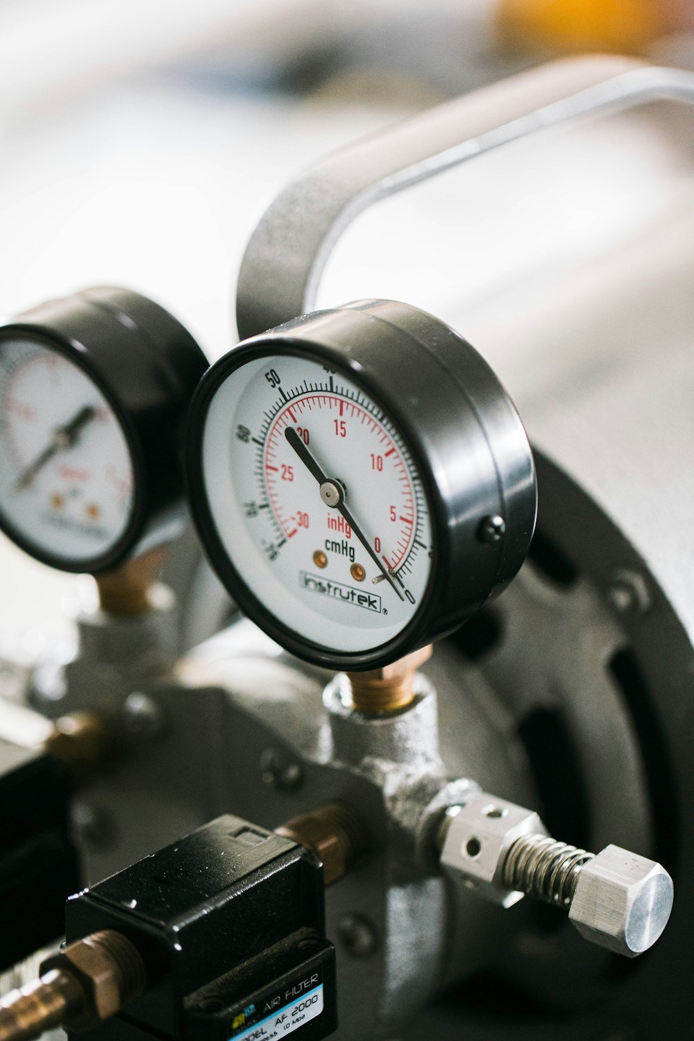 Pressure gauges and valves